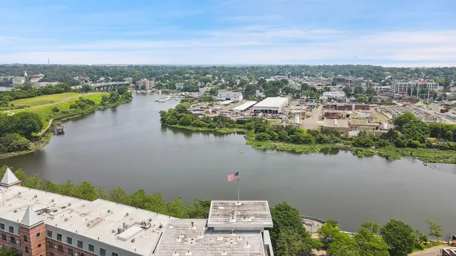 a view of a lake with a city view