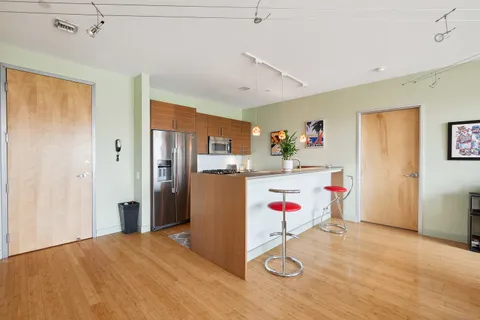 a utility room with cabinet and utility room