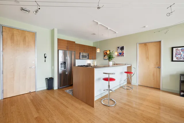 a utility room with cabinet and utility room