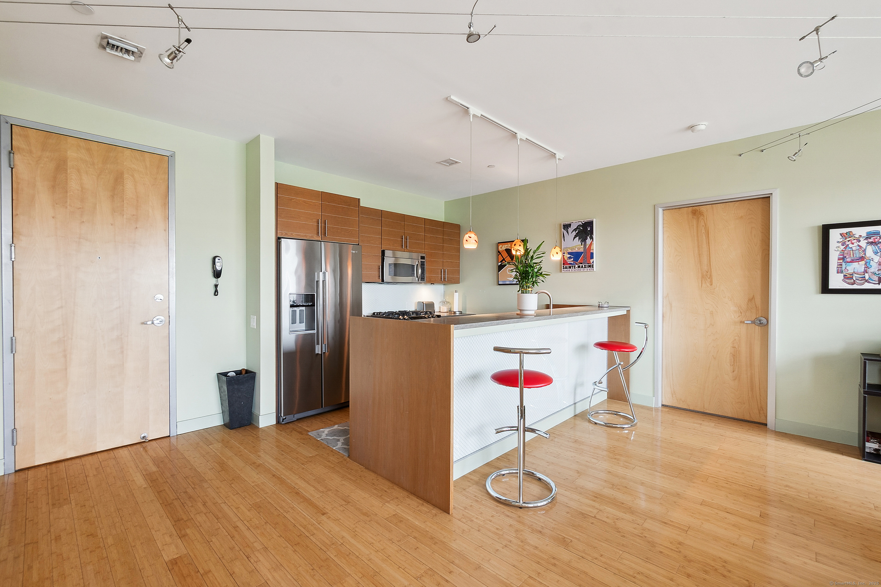 33 North Water Street, Unit 505 Norwalk, CT 06854 - Photo 6 of 25 a utility room with cabinet and utility room
