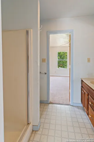 a view of room with window and hardwood