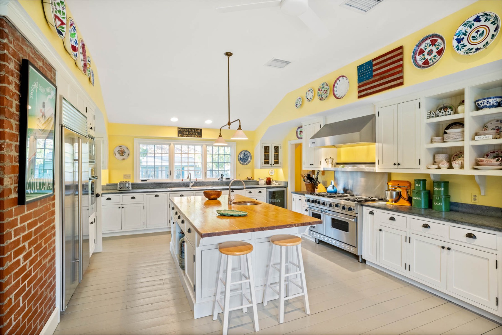 85 North Reservoir Road Vineyard Haven, MA 02568 - Photo 11 of 42 a kitchen with stainless steel appliances granite countertop a stove a sink and a refrigerator