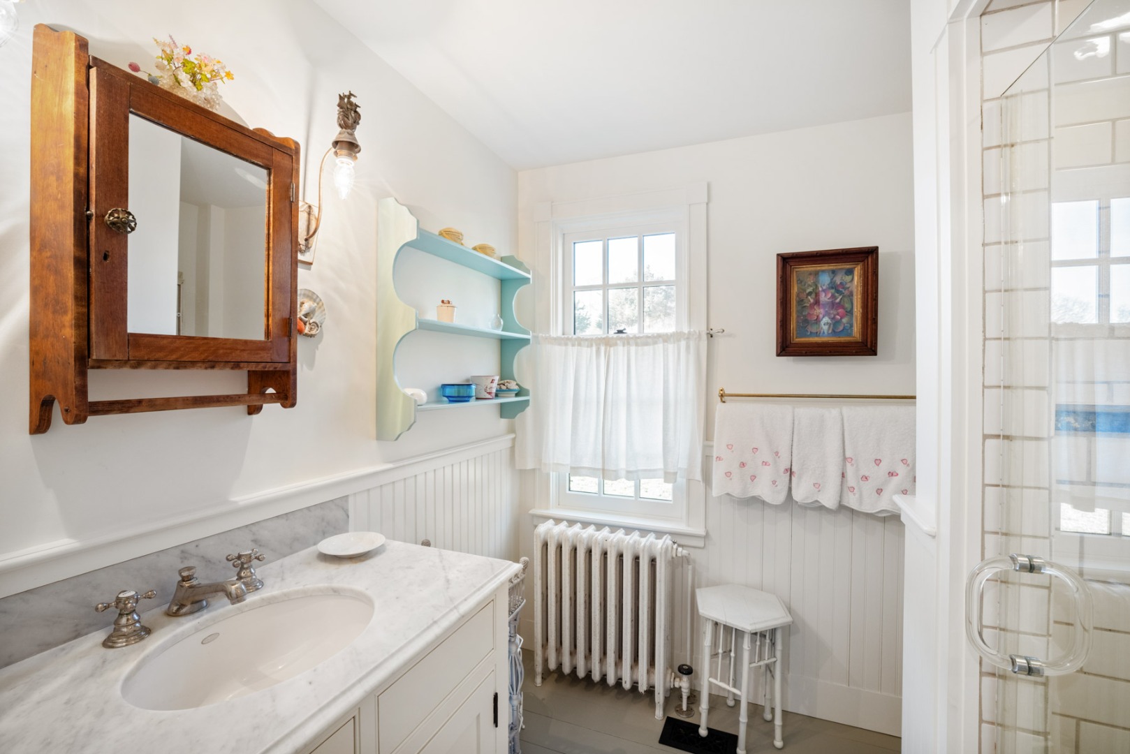 85 North Reservoir Road Vineyard Haven, MA 02568 - Photo 21 of 42 a bathroom with a sink and a mirror
