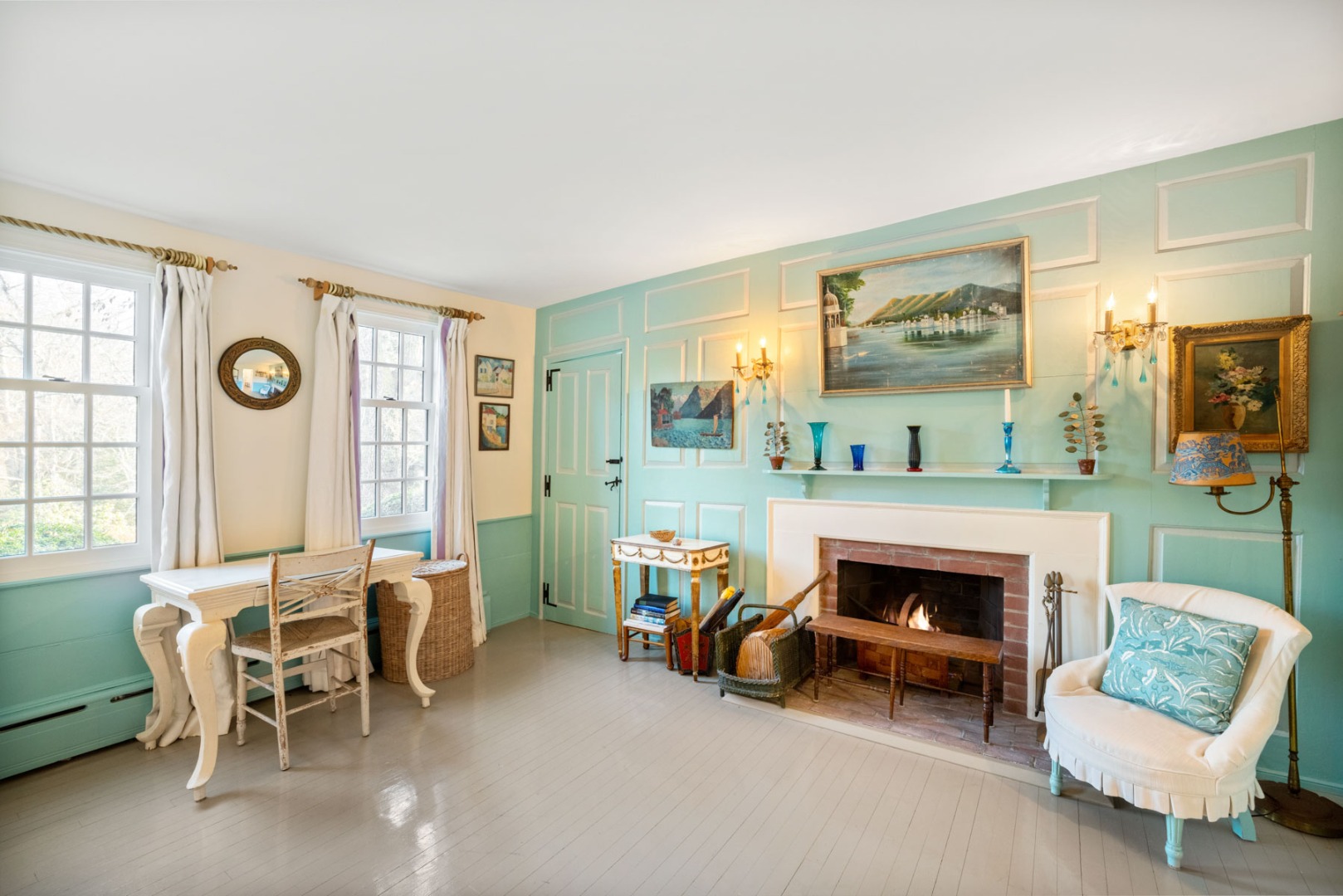 85 North Reservoir Road Vineyard Haven, MA 02568 - Photo 24 of 42 a living room with furniture and a fireplace