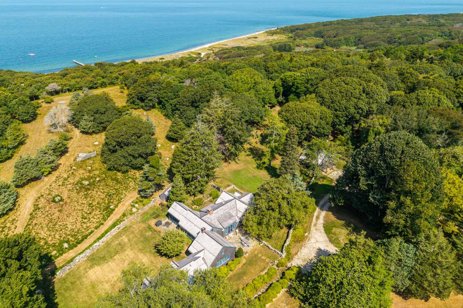 85 North Reservoir Road Vineyard Haven, MA 02568 - Photo 3 of 42 a view of a yard of an ocean