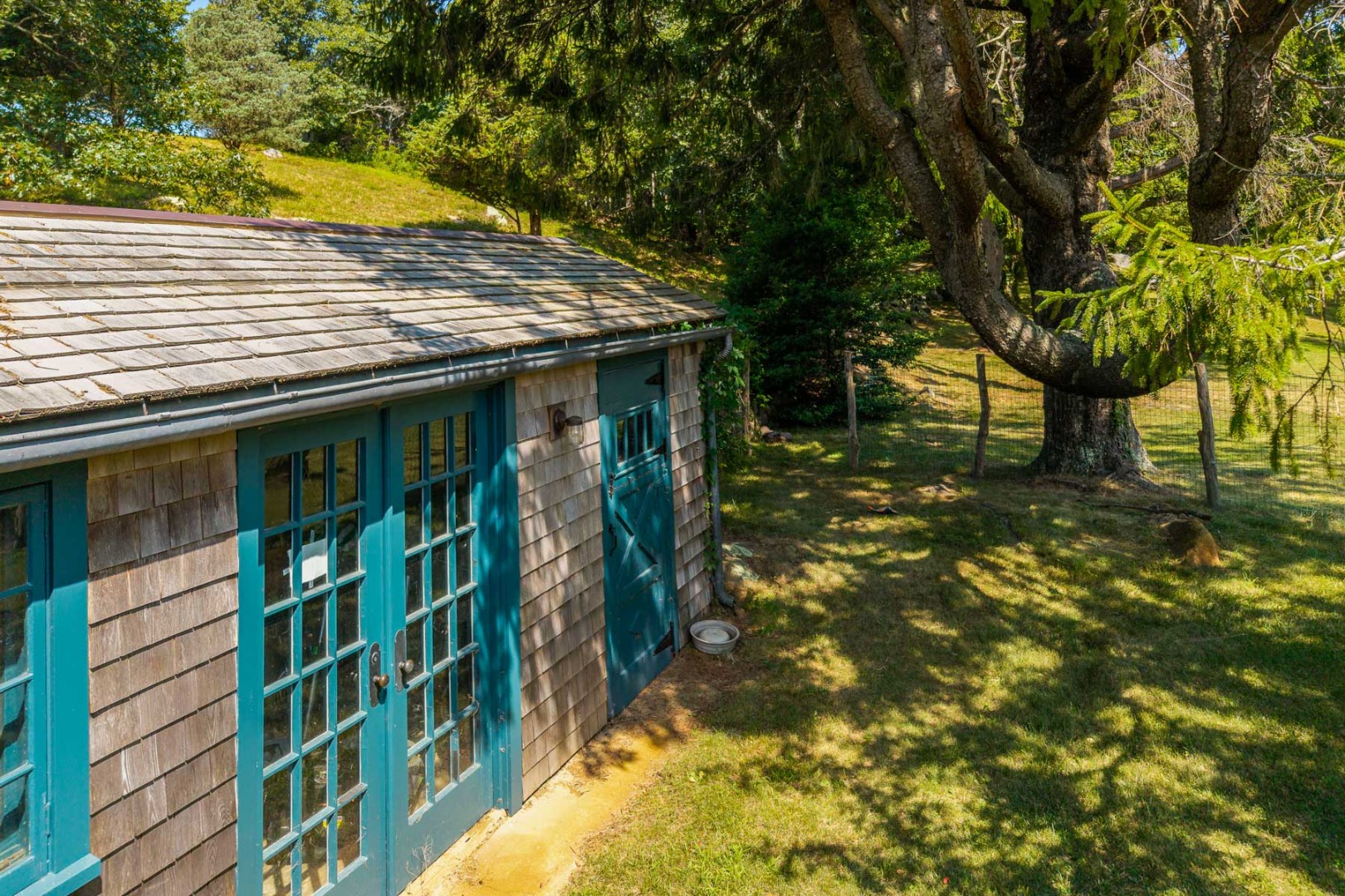 85 North Reservoir Road Vineyard Haven, MA 02568 - Photo 42 of 42 a view of a house with a tree