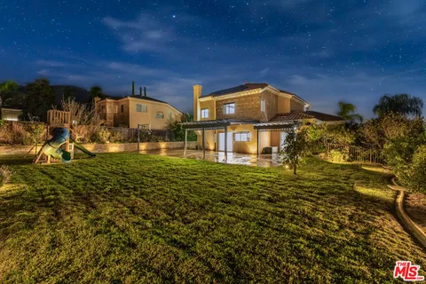 a view of a big yard next to a building