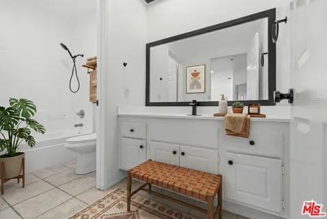 a view of a room with storage and utility room