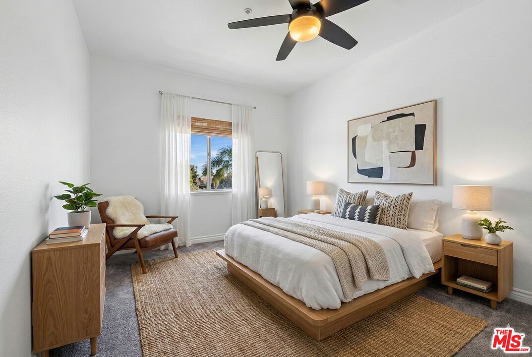 6758 Ridgeline Avenue San Bernardino, CA 92407 - Photo 37 of 67 a bedroom with a bed and painting on the wall