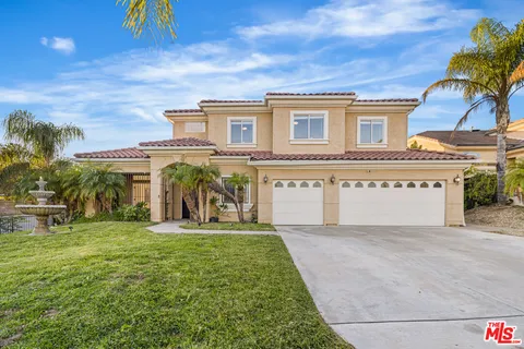 a view of a building with a yard