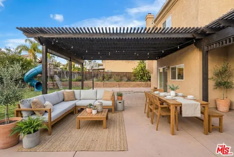 an aerial view of a house with swimming pool