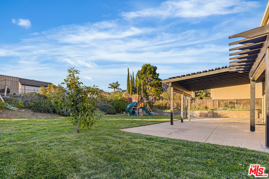 6758 Ridgeline Avenue San Bernardino, CA 92407 - Photo 52 of 67 a view of a park with swings and slides