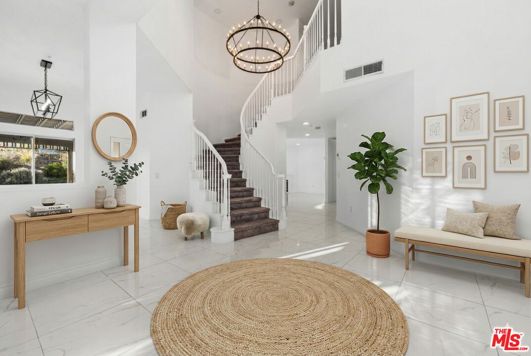 6758 Ridgeline Avenue San Bernardino, CA 92407 - Photo 7 of 67 a living room with furniture potted plant and white walls