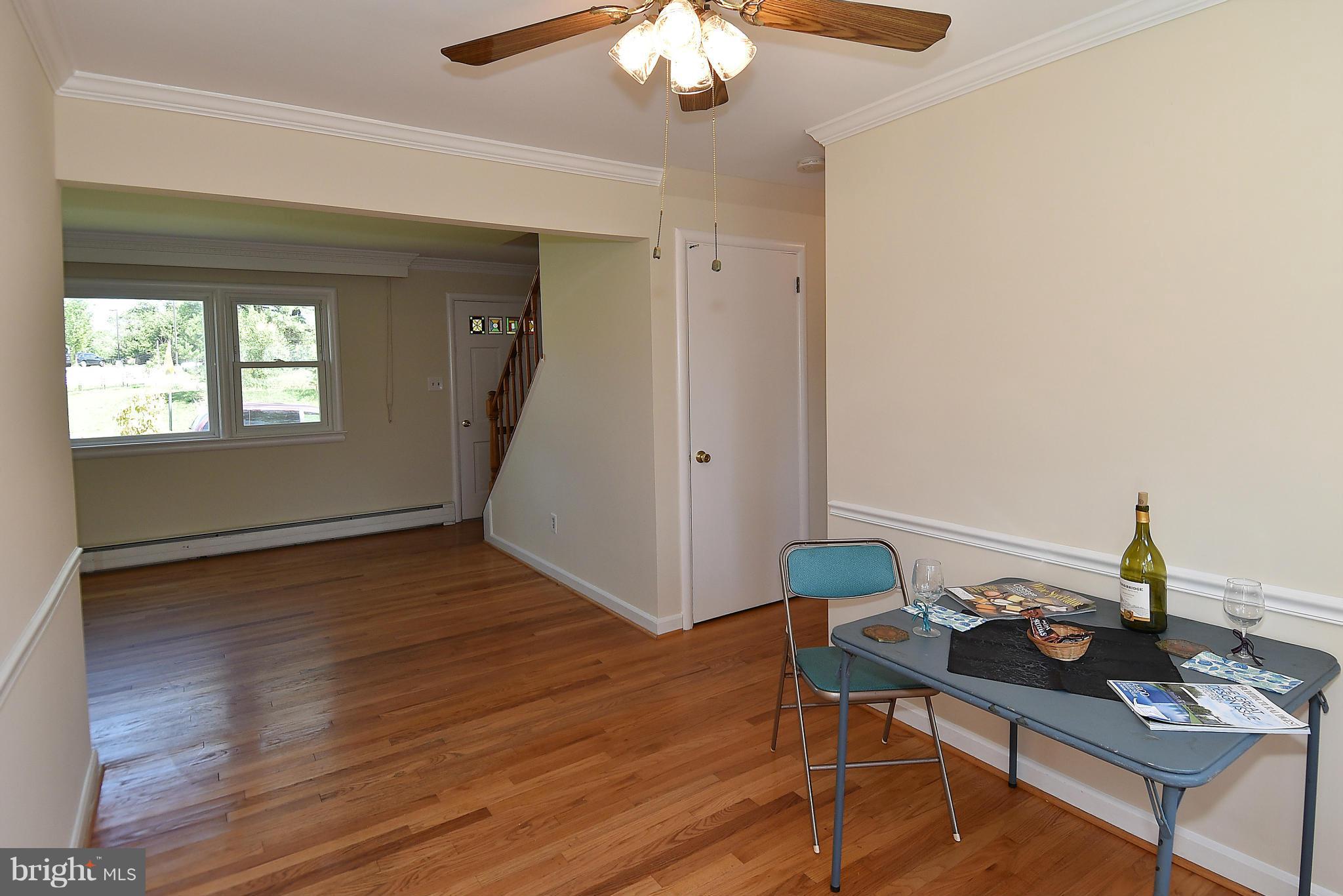 3206 Weller Road Silver Spring, MD 20906 - Photo 13 of 30 a living room with furniture and a wooden floor