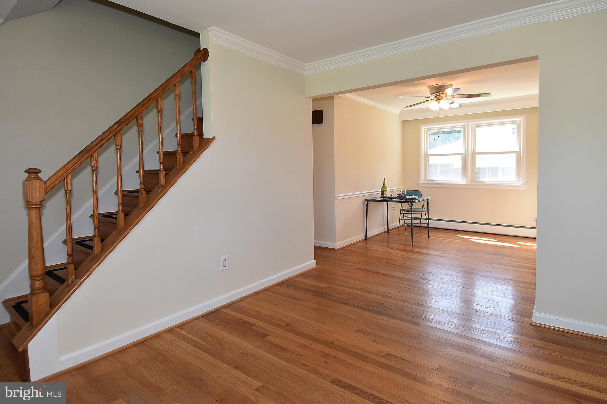 3206 Weller Road Silver Spring, MD 20906 - Photo 14 of 30 a view of empty room with wooden floor and fan