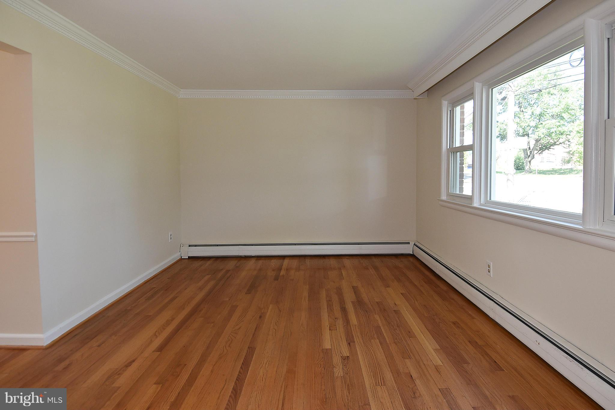 3206 Weller Road Silver Spring, MD 20906 - Photo 18 of 30 a view of a room with wooden floor and window