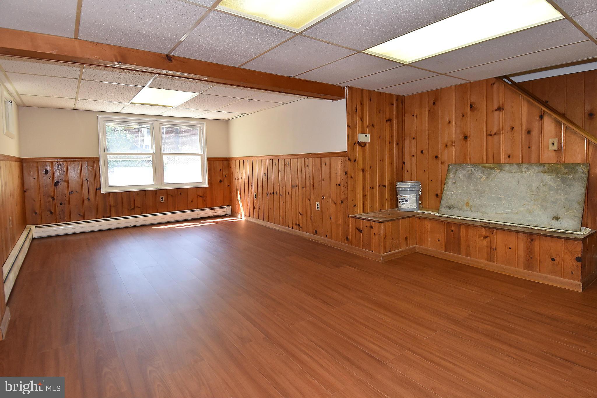 3206 Weller Road Silver Spring, MD 20906 - Photo 25 of 30 an empty room with wooden floor and windows