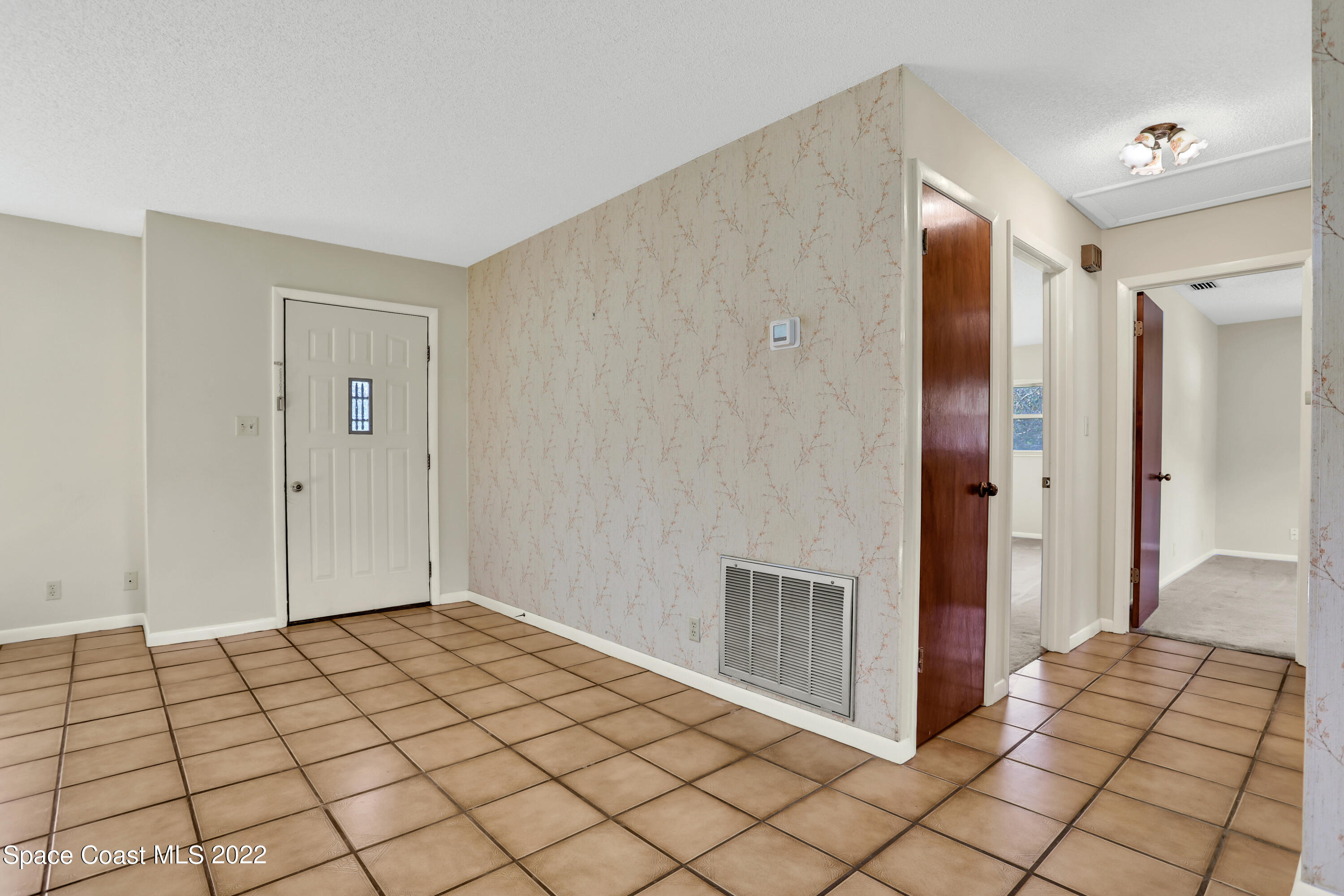 4124 April Lane Mims, FL 32754 - Photo 15 of 44 a view of an empty room