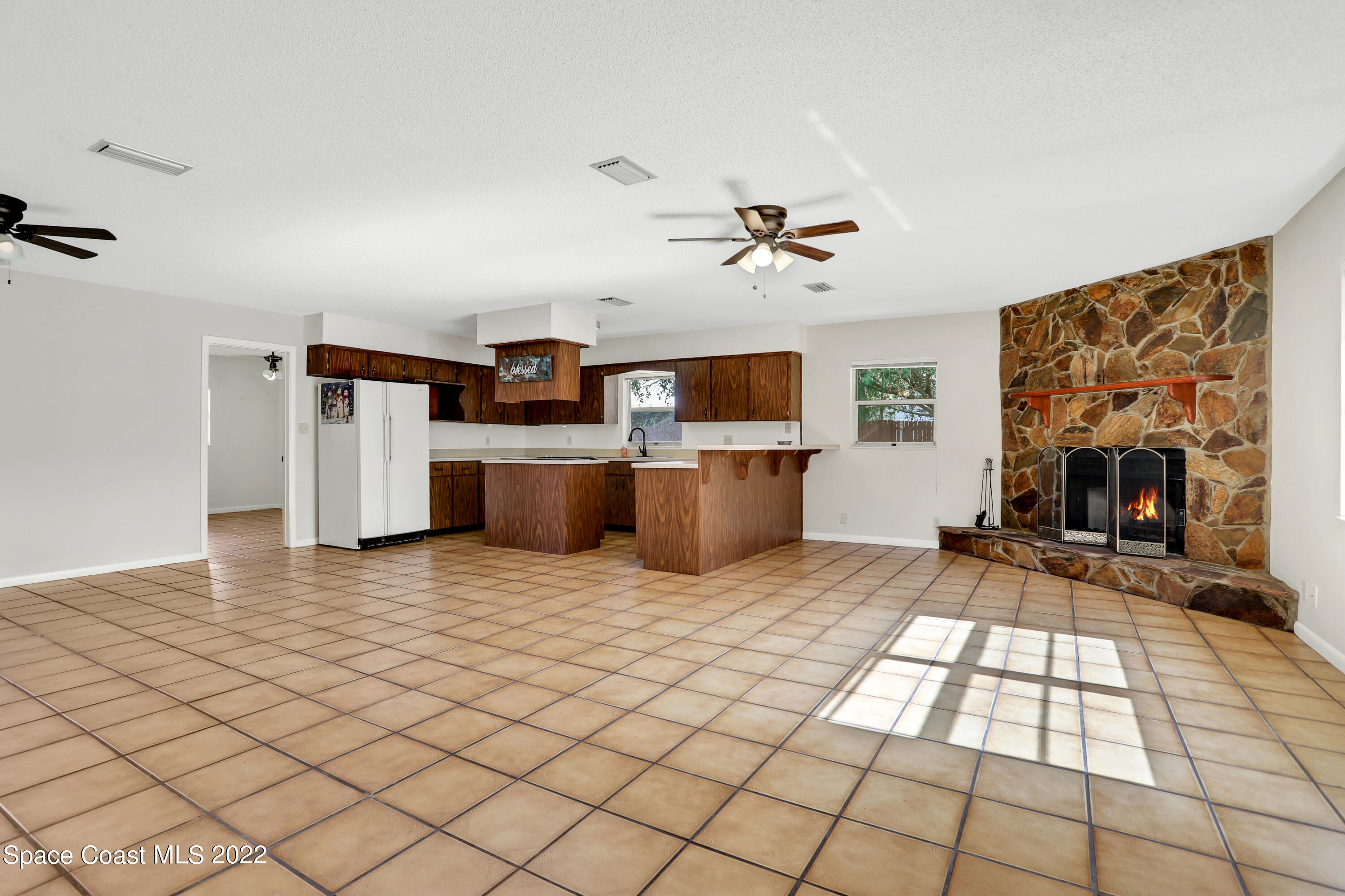 4124 April Lane Mims, FL 32754 - Photo 16 of 44 a view of living room and kitchen with furniture