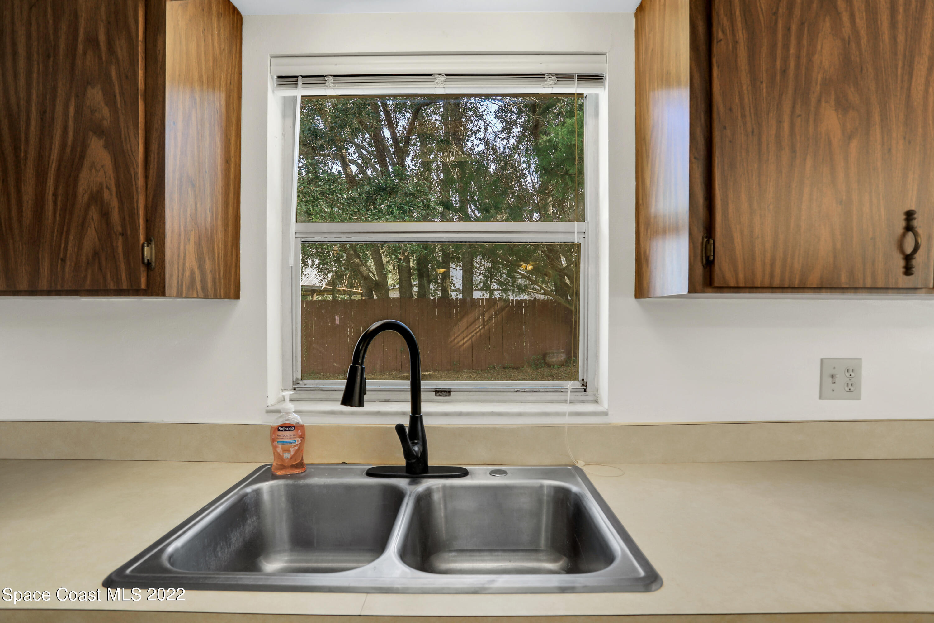 4124 April Lane Mims, FL 32754 - Photo 25 of 44 a close view of sink and tap