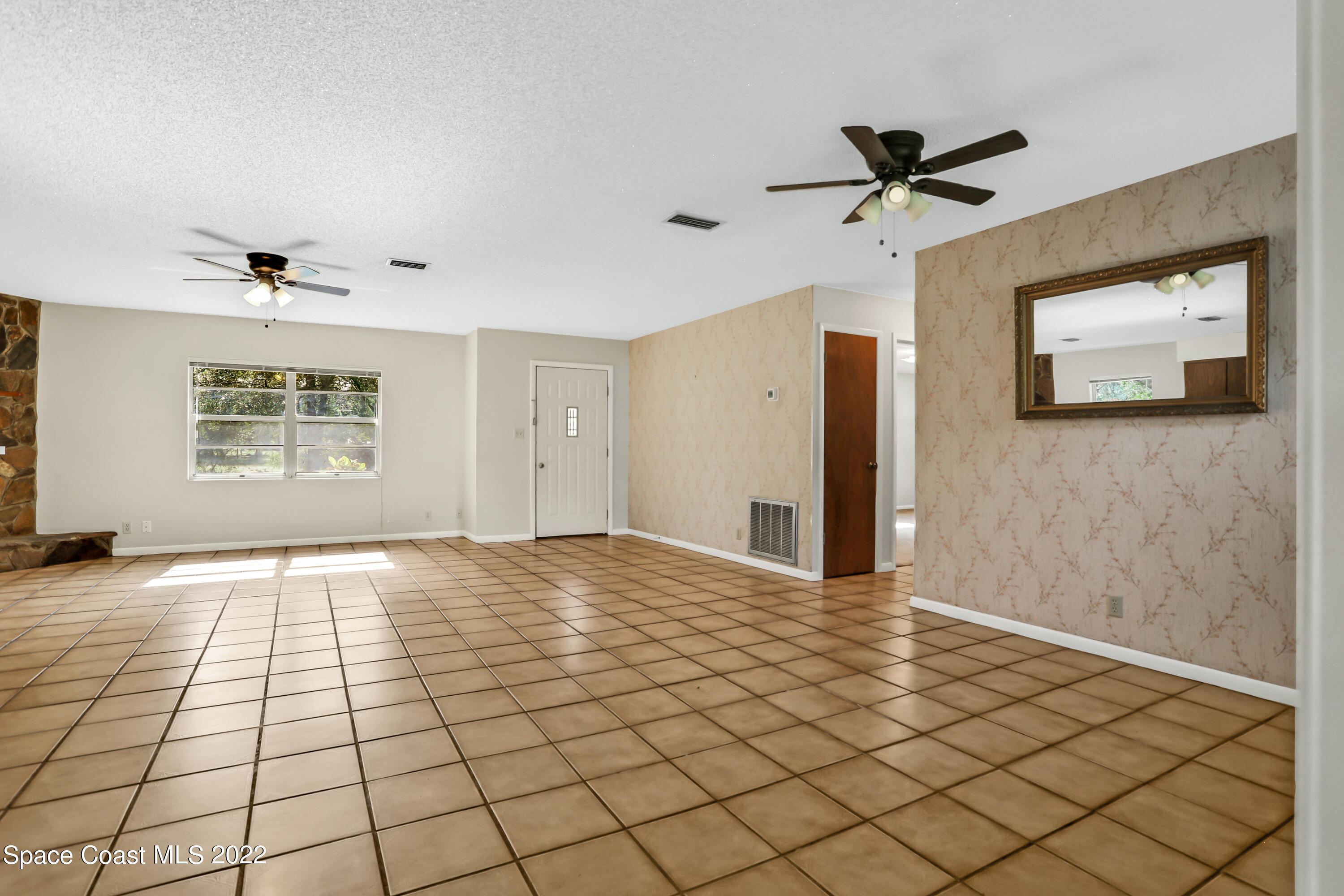 4124 April Lane Mims, FL 32754 - Photo 28 of 44 a view of an empty room and window
