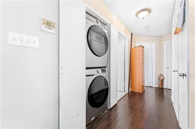 a view of a hallway with washer and dryer