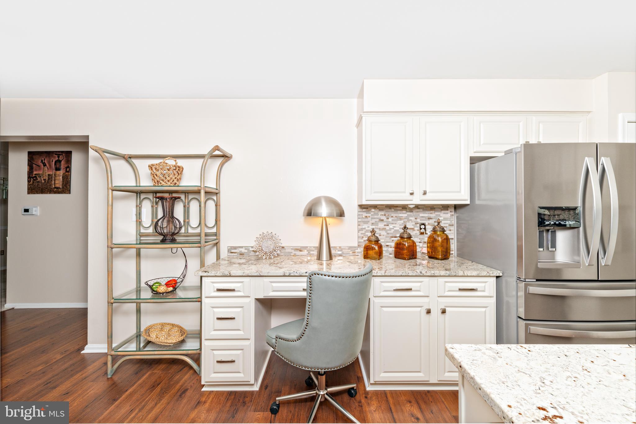 72 Rosalind Circle Sicklerville, NJ 08081 - Photo 13 of 47 a kitchen with stainless steel appliances a refrigerator and a stove top oven