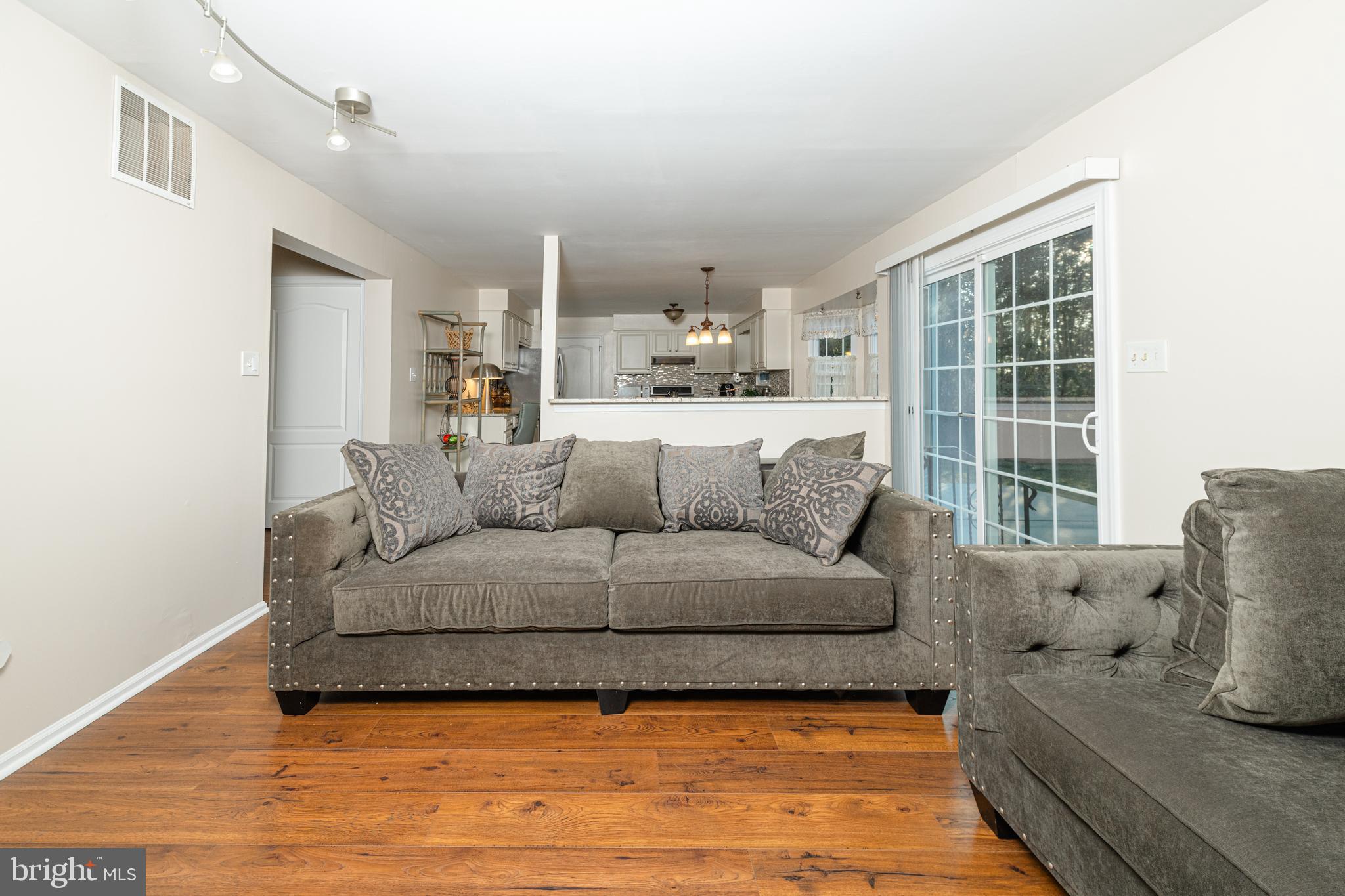 72 Rosalind Circle Sicklerville, NJ 08081 - Photo 14 of 47 a living room with furniture and a large window