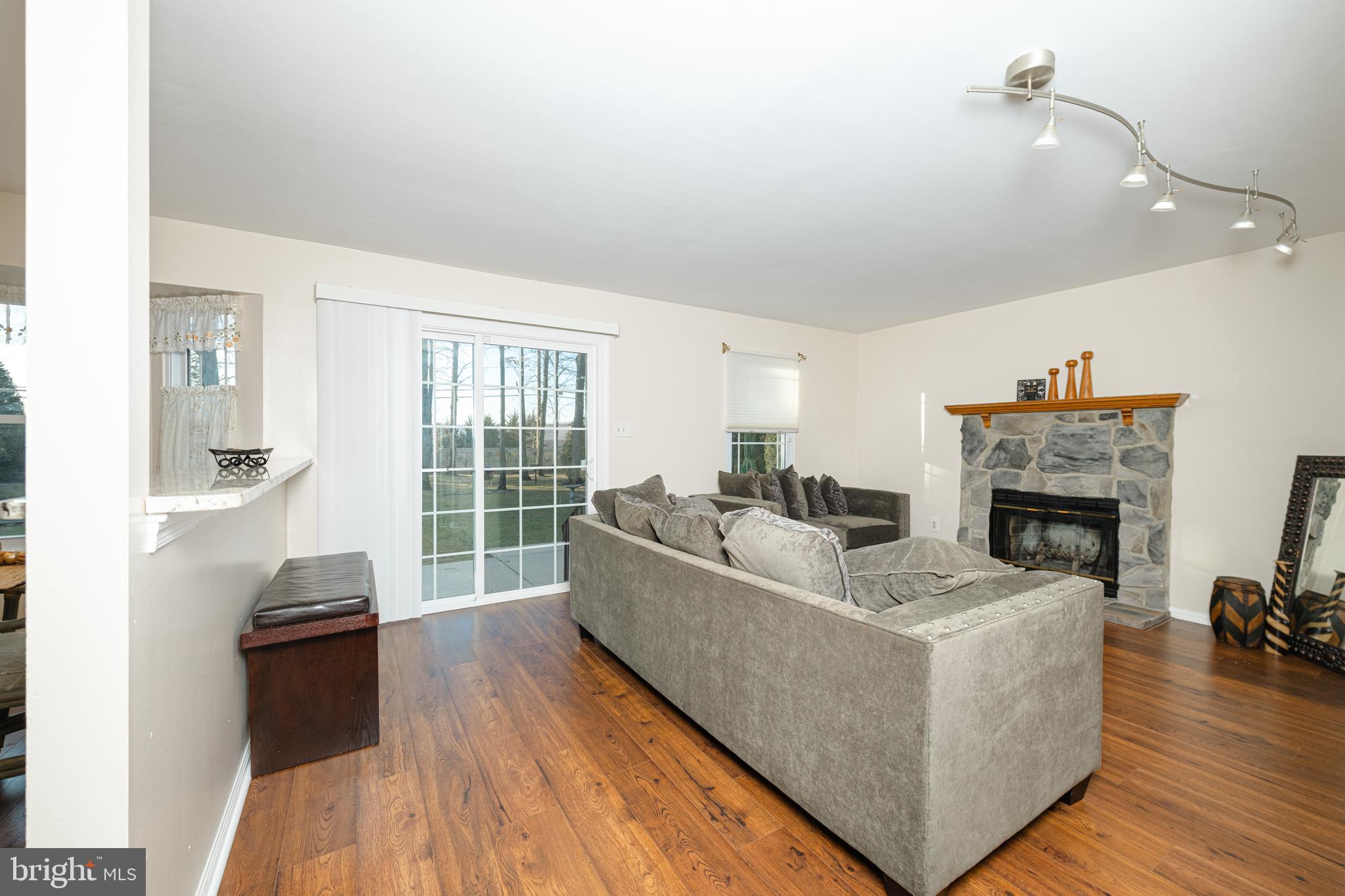 72 Rosalind Circle Sicklerville, NJ 08081 - Photo 16 of 47 a living room with furniture and a fireplace