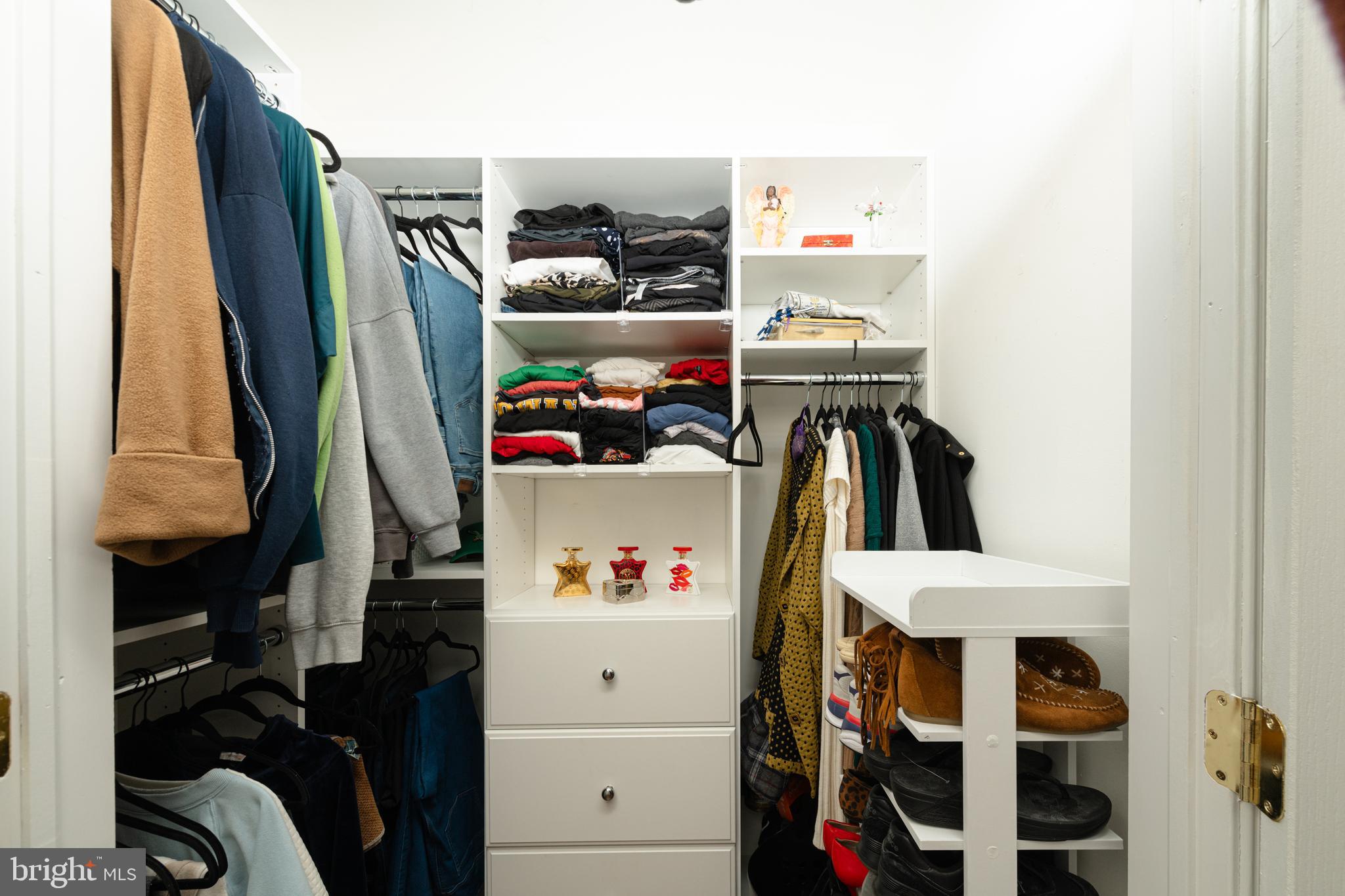 72 Rosalind Circle Sicklerville, NJ 08081 - Photo 23 of 47 a view of walk in closet with clothes and shoes