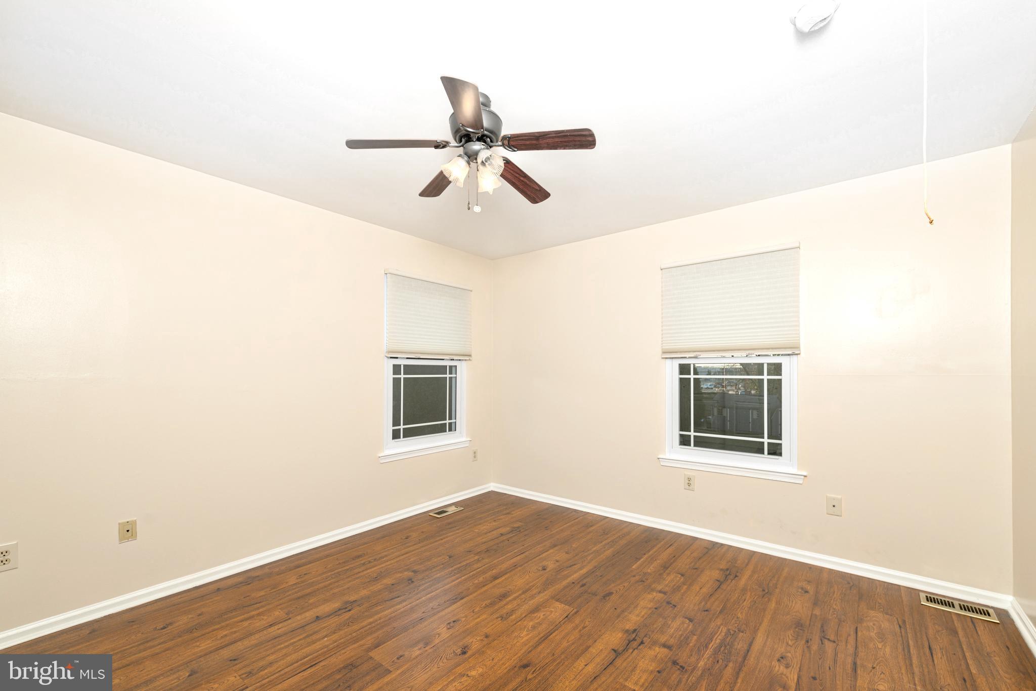 72 Rosalind Circle Sicklerville, NJ 08081 - Photo 30 of 47 a view of a room with wooden floor and ceiling fan