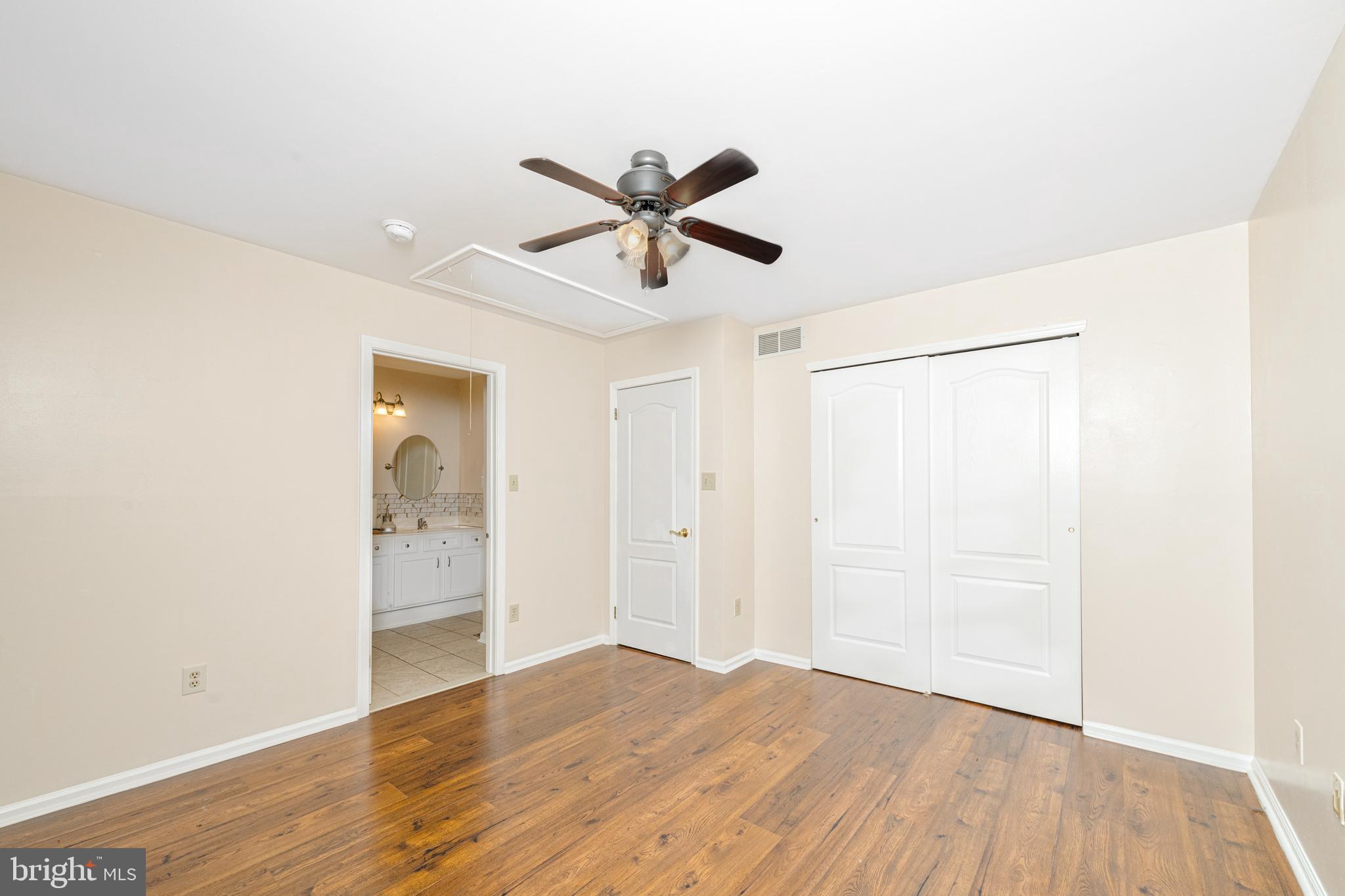 72 Rosalind Circle Sicklerville, NJ 08081 - Photo 31 of 47 a view of a livingroom with a hardwood floor and a ceiling fan