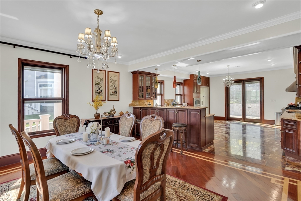 95 Commonwealth Avenue Newton, MA 02467 - Photo 12 of 42 a view of a dining room with furniture and chandelier