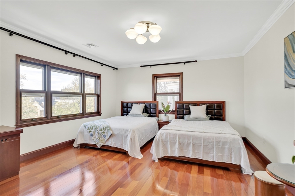 95 Commonwealth Avenue Newton, MA 02467 - Photo 24 of 42 a bedroom with two beds and a window