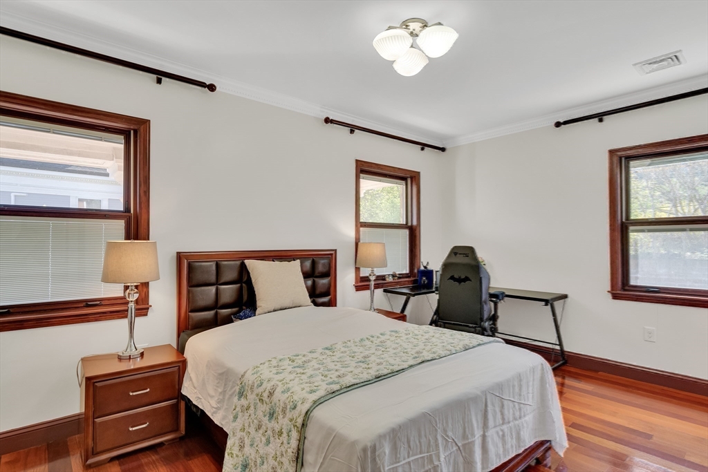 95 Commonwealth Avenue Newton, MA 02467 - Photo 25 of 42 a bedroom with bed and a window