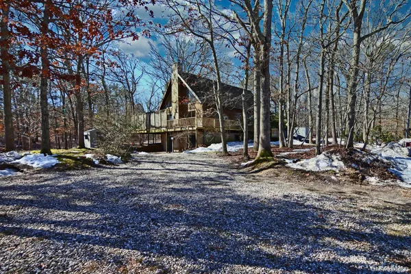 a view of a house with a snow