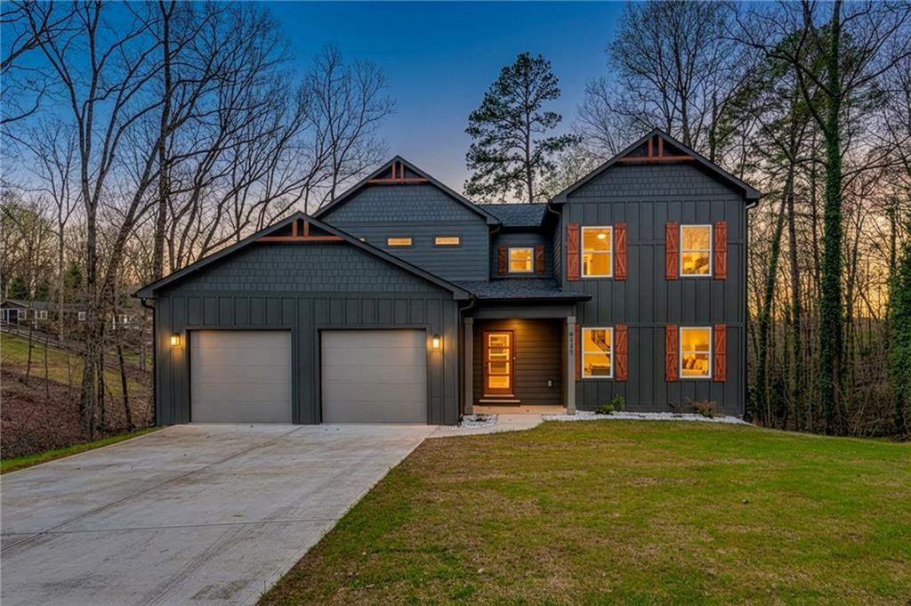 6121 Timberidge Drive Gainesville, GA 30506 - Photo 1 of 44 a front view of a house with a yard