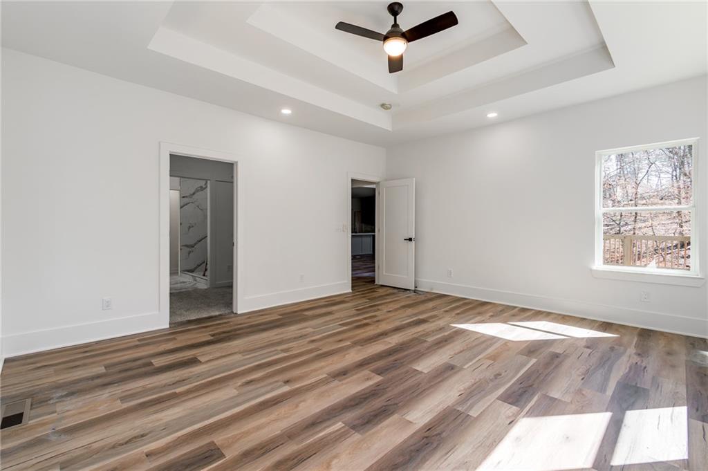 6121 Timberidge Drive Gainesville, GA 30506 - Photo 21 of 44 a view of a livingroom with a ceiling fan and window