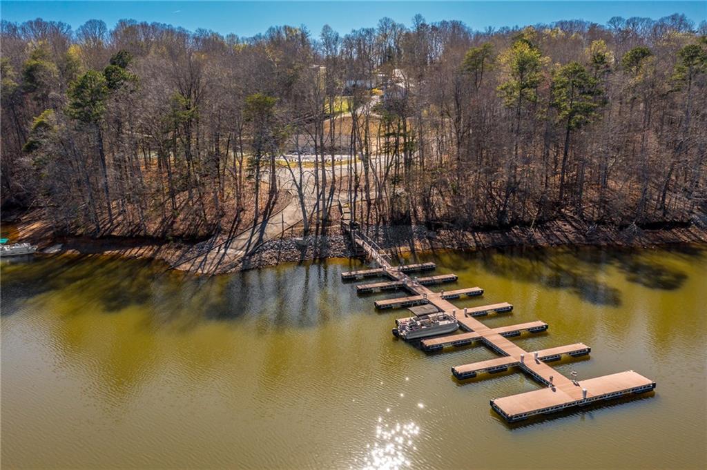 6121 Timberidge Drive Gainesville, GA 30506 - Photo 3 of 44 a view of a lake with a mountain view
