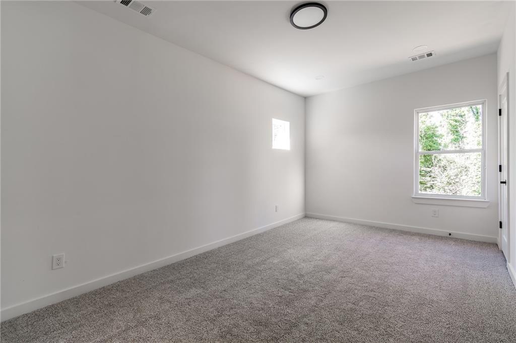 6121 Timberidge Drive Gainesville, GA 30506 - Photo 33 of 44 a view of empty room with window