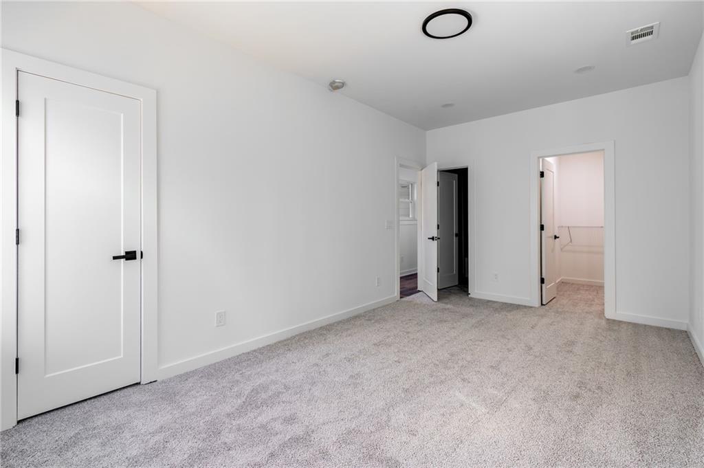 6121 Timberidge Drive Gainesville, GA 30506 - Photo 34 of 44 an empty room with closet and entryway