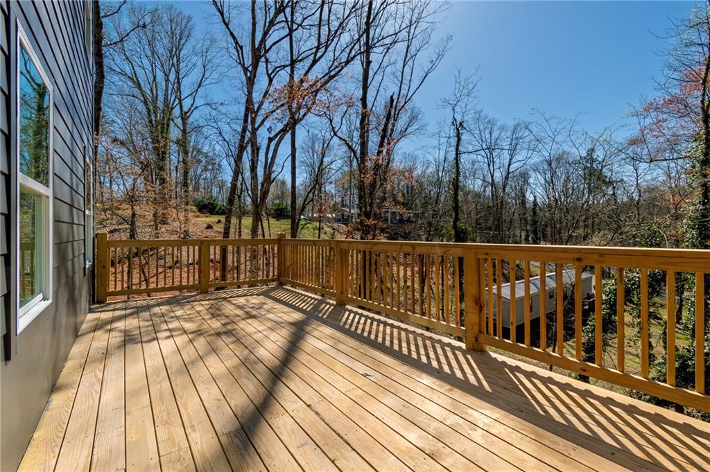 6121 Timberidge Drive Gainesville, GA 30506 - Photo 40 of 44 a view of balcony with wooden floor and fence