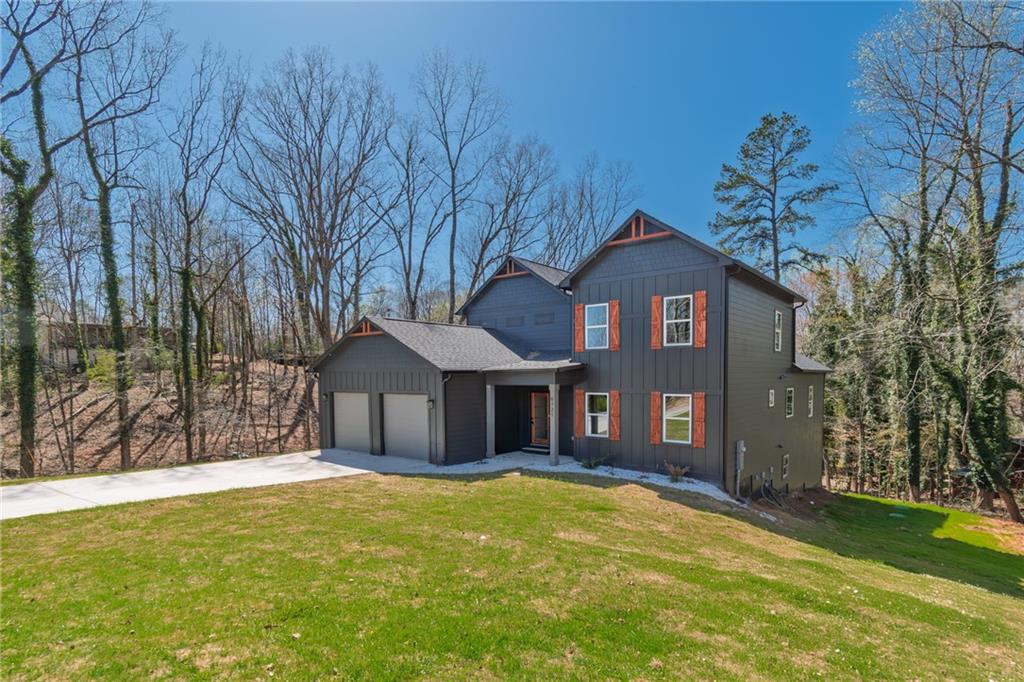 6121 Timberidge Drive Gainesville, GA 30506 - Photo 4 of 44 a front view of a house with a yard
