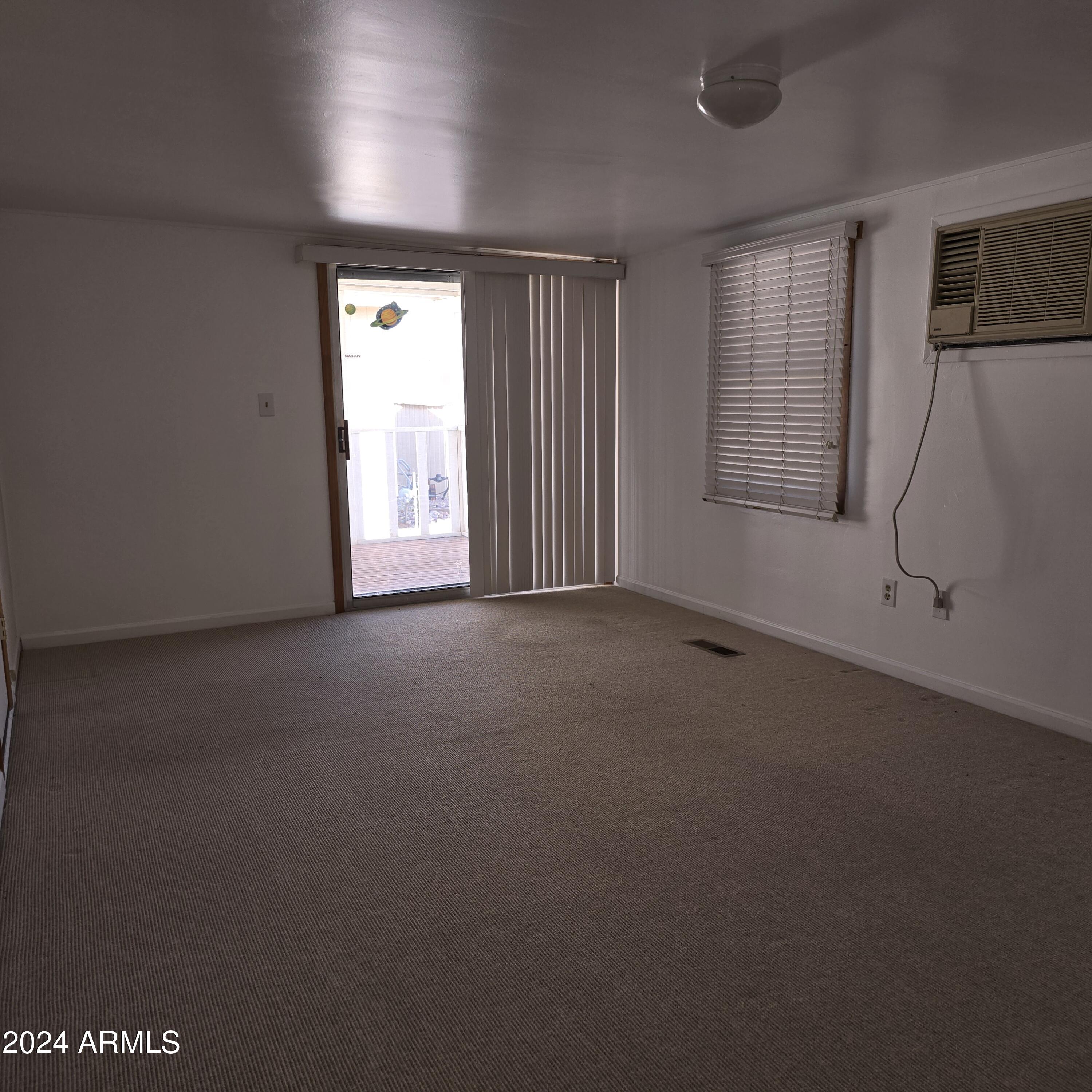 2701 East Utopia Road, Unit 3 Phoenix, AZ 85050 - Photo 20 of 22 Enclosed arizona room added