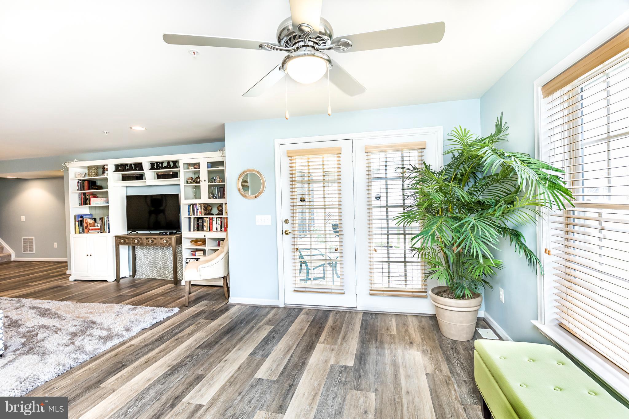 8228 Academy Road, Unit 19 Ellicott City, MD 21043 - Photo 54 of 72 Basement spacious family room with walk out