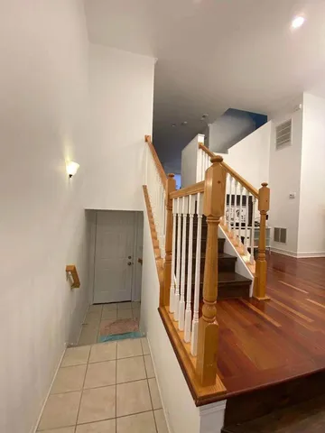 a view of a hallway view with staircase