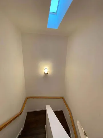 a view of small space with racks on the wall