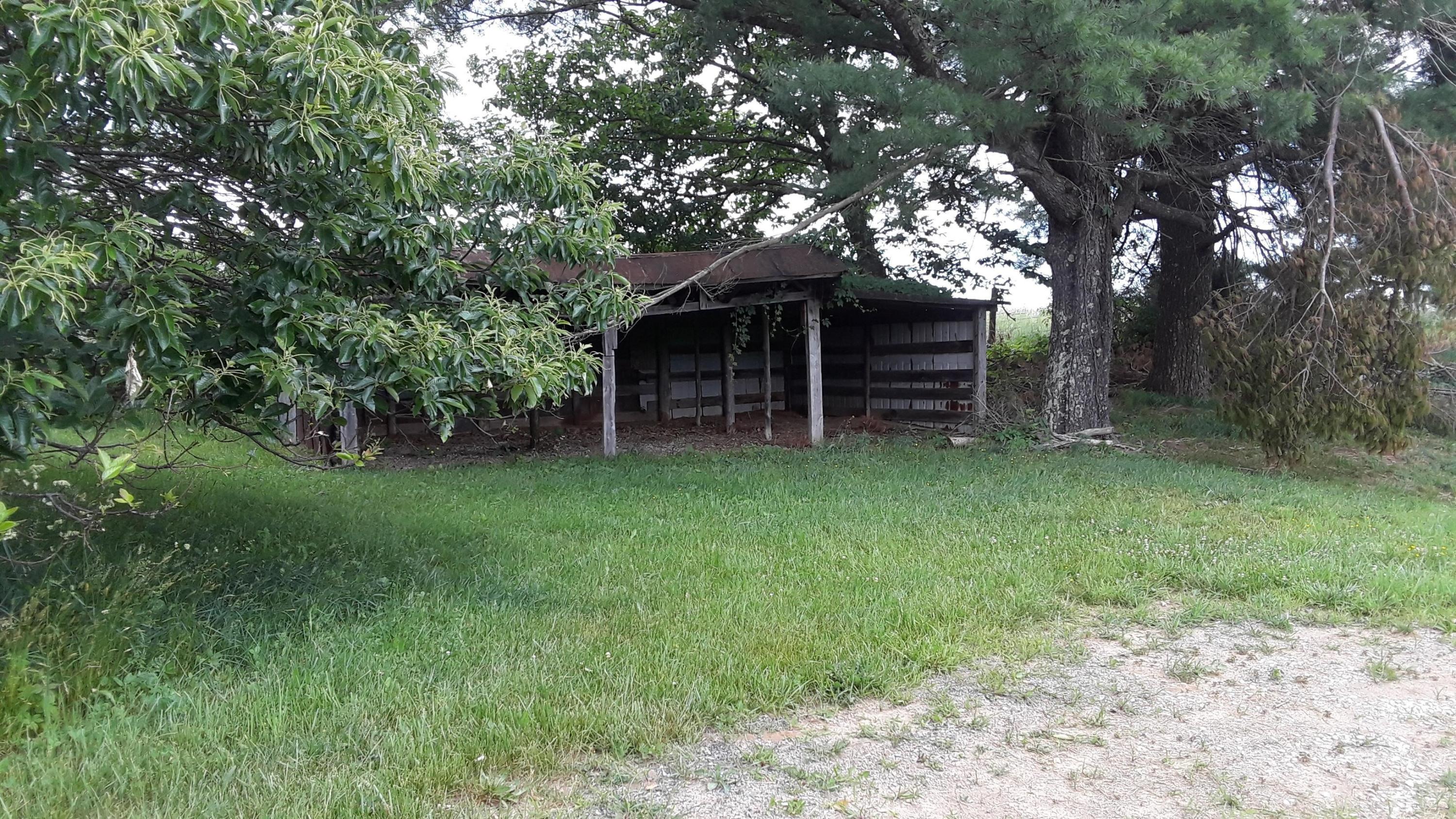 6870 Conner Road Northeast Copper Hill, VA 24079 - Photo 3 of 9 a view of a house with a yard and tree