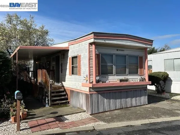 a view of balcony with wooden floor