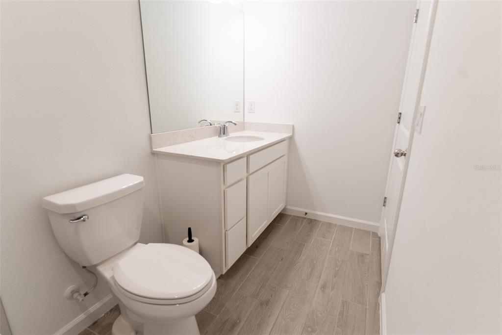 4501 Northwest 14th Loop Ocala, FL 34482 - Photo 18 of 38 a bathroom with a sink and a toilet